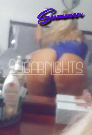 Summer in Dallas shows off her curves in a blue outfit for a private session.
